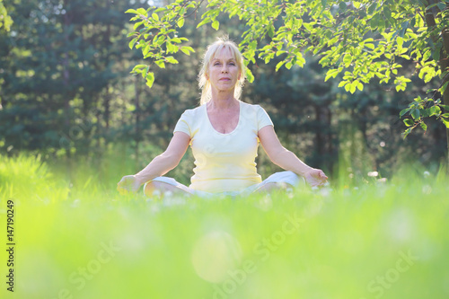 Wallpaper Mural Yoga woman in the park Torontodigital.ca