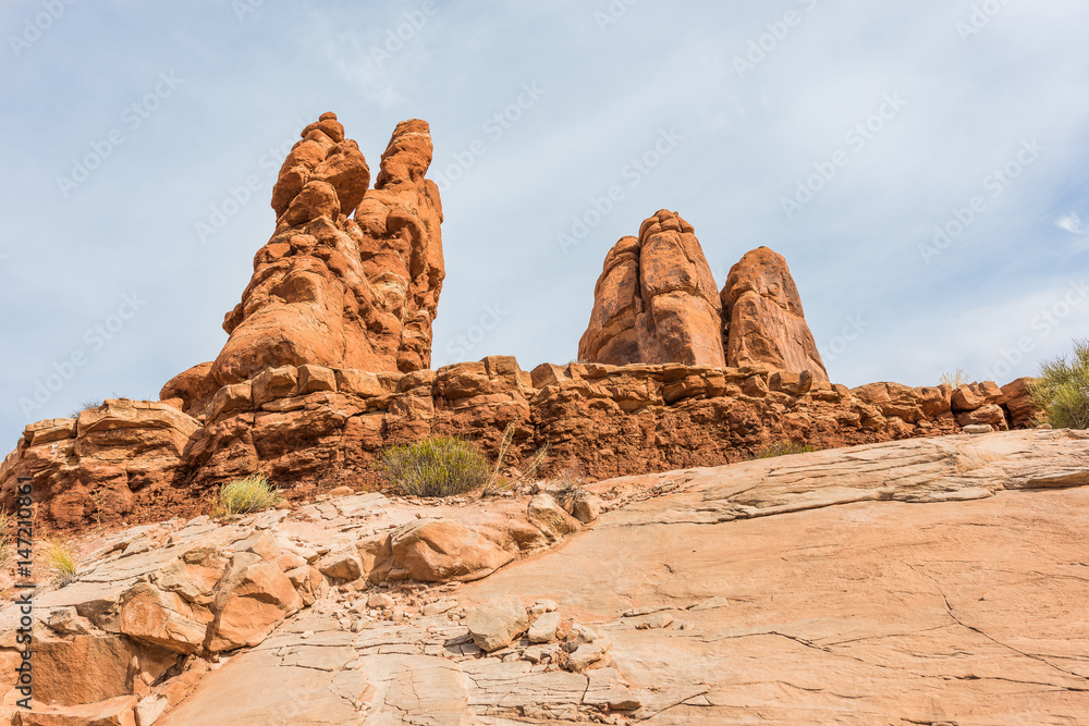 Tall red balancing rocks in Arches National Park in canyons Tall red balancing rocks in Arches National Park in canyons