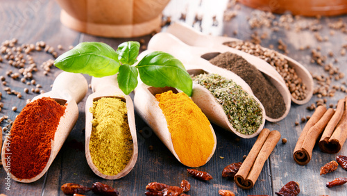 Fototapeta Naklejka Na Ścianę i Meble -  Variety of spices on kitchen table