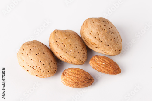 Whole almonds nuts isolated on white background