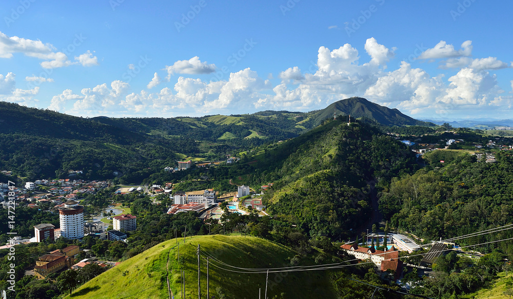 Landscape horizon with a small city in the mountains seen from a high angle