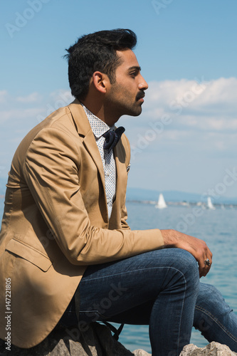 Handsome man posing in a vacation context