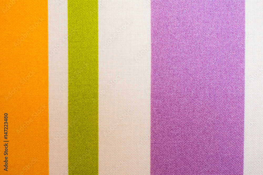 Fototapeta premium Fabric texture of multi-colored vertical stripes