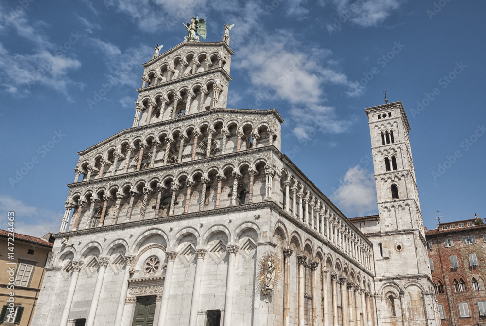 13th century Romanesque facade of the San Michele in Foro, a Roman Catholic basilica church in Lucca, Tuscany, Italy