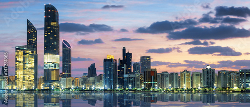 View of Abu Dhabi Skyline at sunset photo
