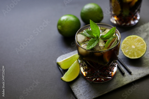 Cold longdrink on dark background. photo