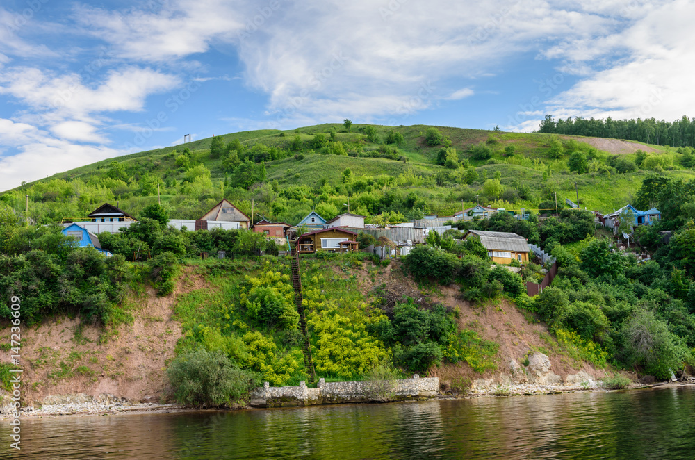 the village on the picturesque green banks of the river Volga near Kazan city, Tatarstan, Russia the village on the picturesque green banks of the river Volga near Kazan city, Tatarstan, Russia