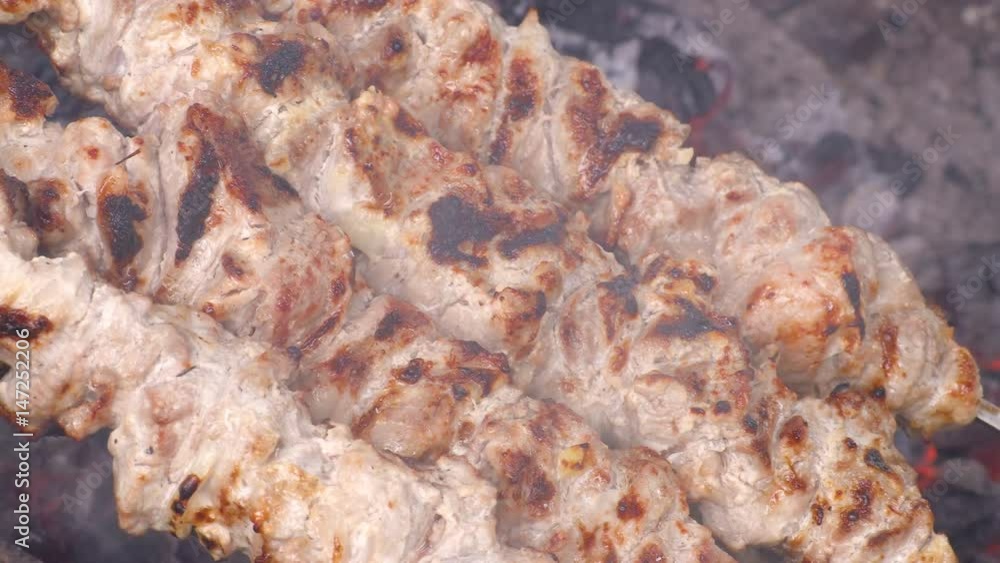 Cooking kebab on the coals. Grilled pork on skewers. Footage clip 4K, UHG, Ultra HD Cooking kebab on the coals. Grilled pork on skewers. Footage clip 4K, UHG, Ultra HD