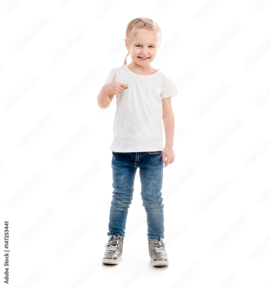 Tiny girl standing pointing at herself, isolated Tiny girl standing pointing at herself, isolated