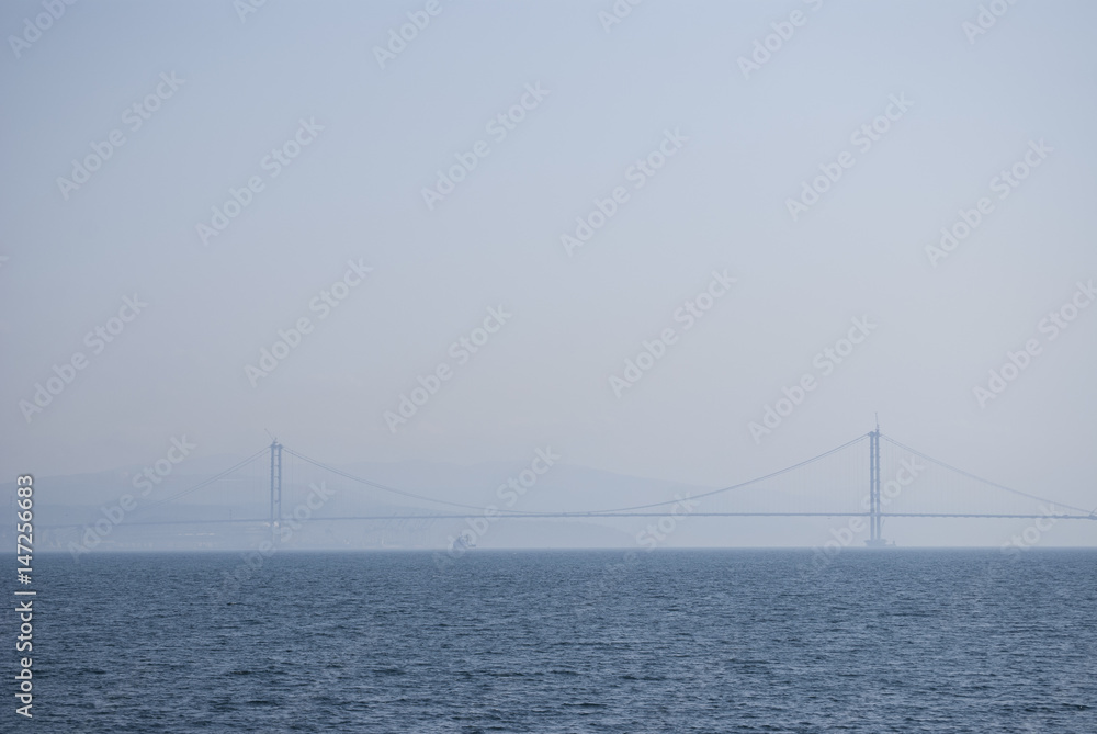 Osman Gazi Bridge at foggy day summer travel Osman Gazi Bridge at foggy day summer travel