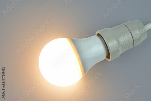 Lit up light bulb with light-emitting diode technology of warm light
