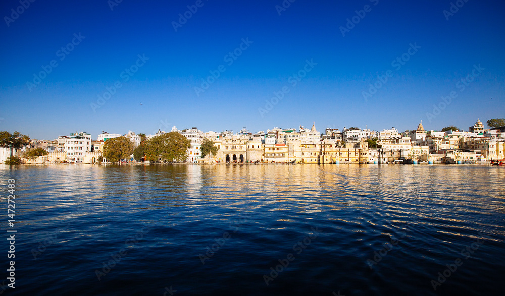Indian architecture in Udaipur Rajasthan. Panoramic view of Pichola lake, India