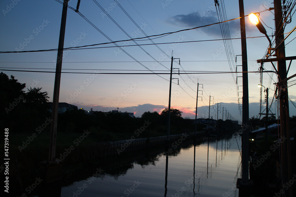 Sunset over the Canal in Suburb of Bangkok