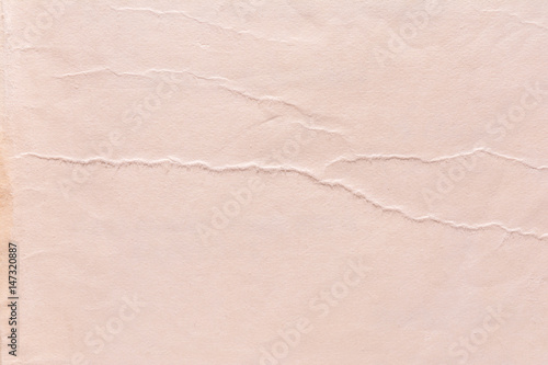 Texture of old shabby and crumpled paper, vintage style, abstract close-up background