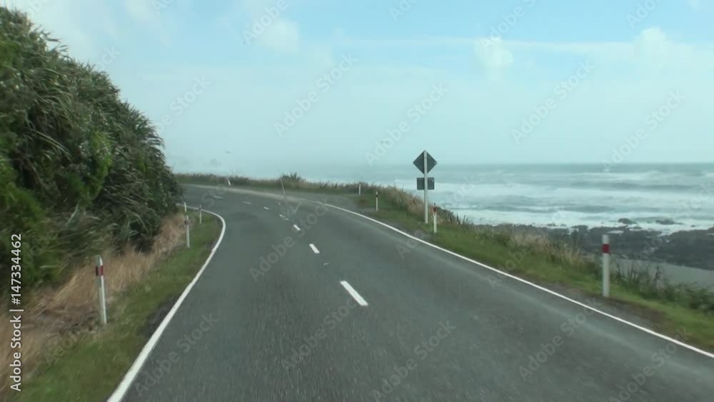 Road trip in the green mountains of New Zealand. Scenic peaks and ridges. Beautiful background of amazing nature. Road trip in the green mountains of New Zealand. Scenic peaks and ridges. Beautiful background of amazing nature.