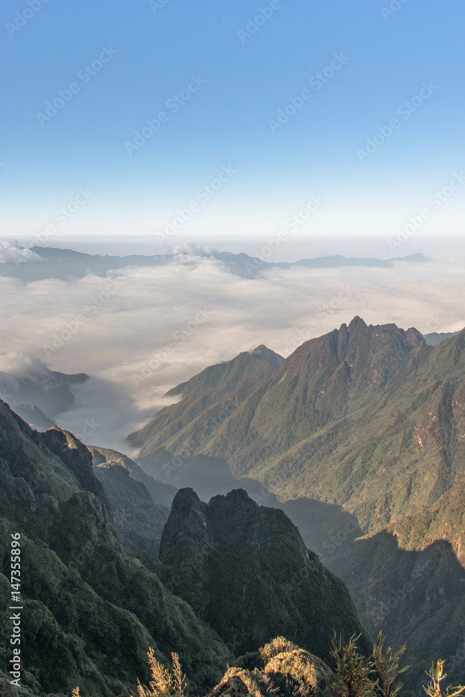 Beautiful mountain ridge in the clouds - Fansipan Mountain in Vietnam