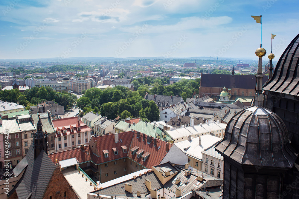 Aerial view of the Cathedral of St. Barbara and the Jesuit Monastery, and other roofs of houses in the historic part of Krakow. Poland. View from St Mary's Cathedral.
