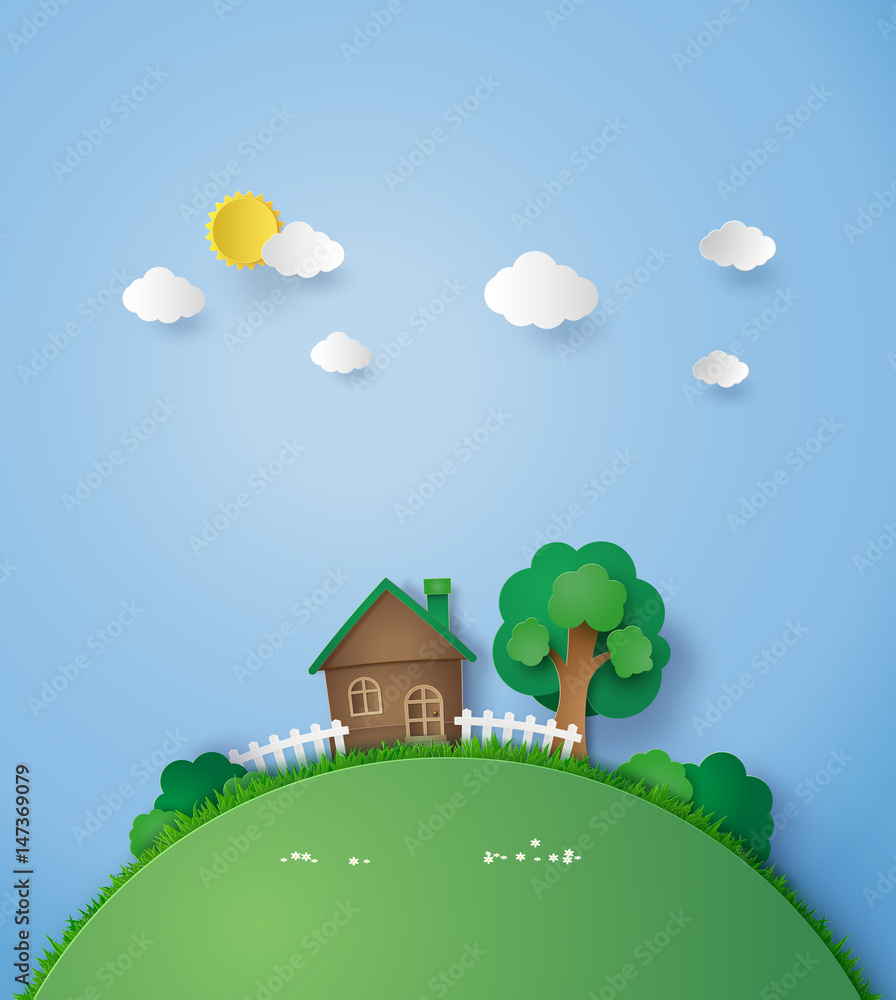 Naklejka premium Little house on the hill with green grass