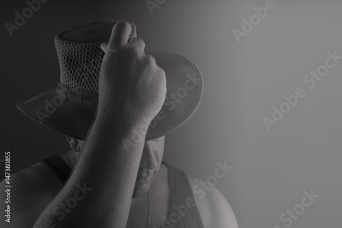 A nice image of a man in a western style cowboy hat.
