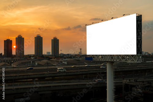 blank billboard beside express way at beautyful sunset used for advertising