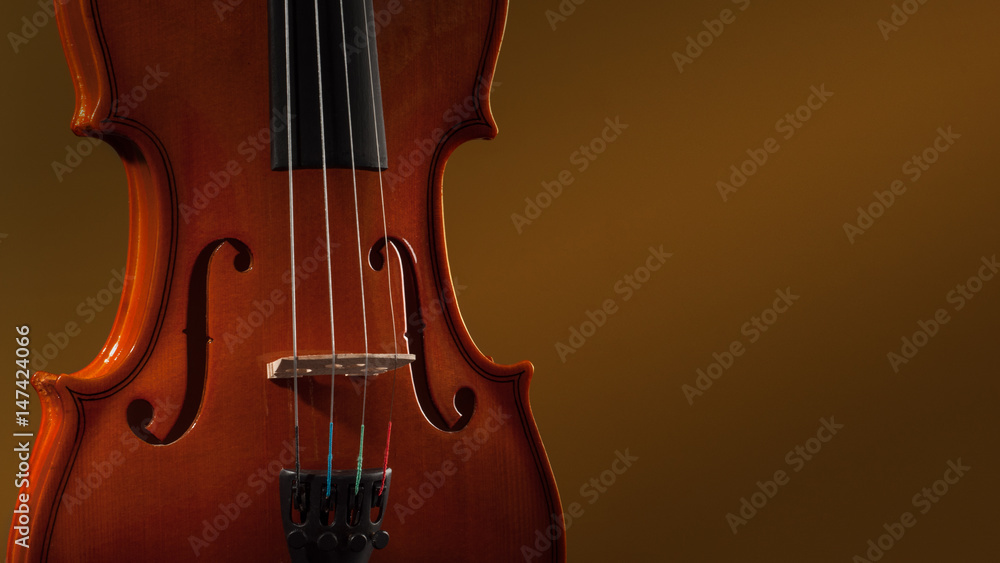 Violin musical instruments of orchestra closeup on black Violin musical instruments of orchestra closeup on black