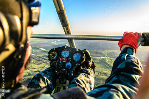 View from cockpit at flight by hang glider photo