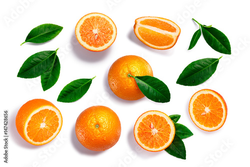 Oranges, whole, split, leaves, paths, top view