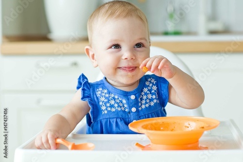 A little baby eats  
