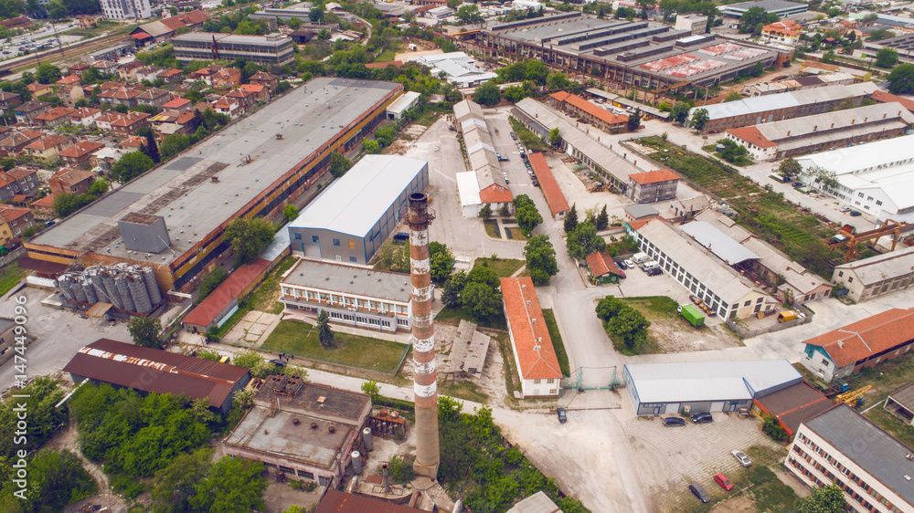 Old Chimney Factory In The Town Shot From Above