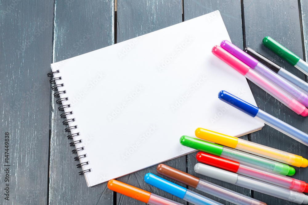 clean sheets on table with markers clean sheets on table with markers