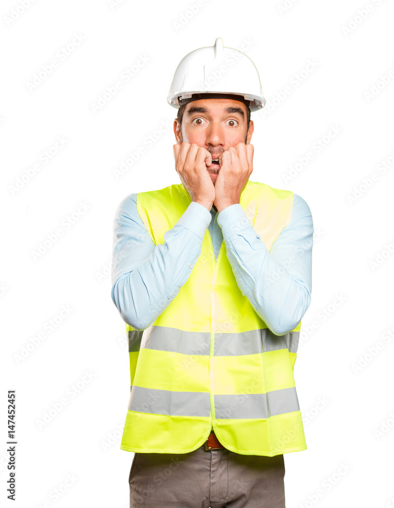Nervous engineer against white background Nervous engineer against white background