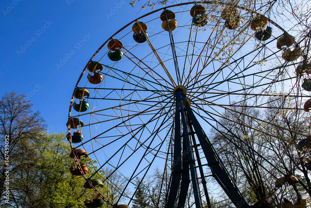 Ferris wheel in a city park Ferris wheel in a city park