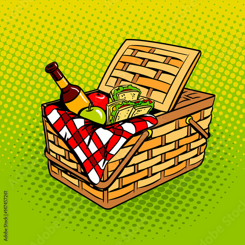 Picnic basket with food products pop art vector