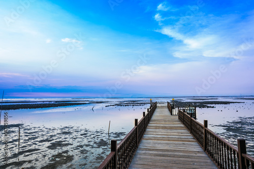 Sea view sunset with bridge and oyster farm