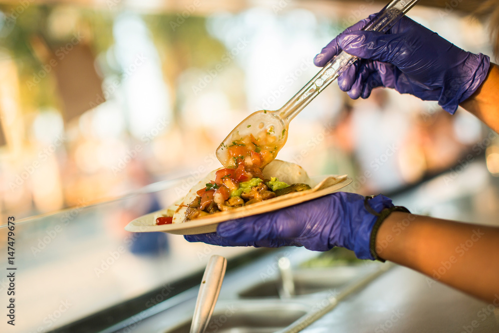 Chef preparing tacos