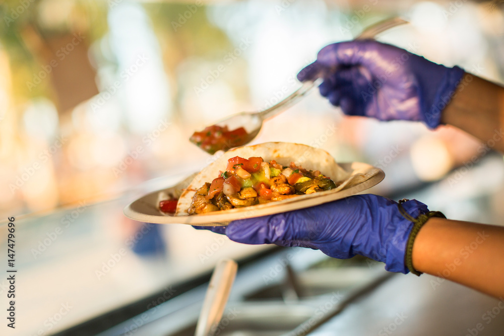 Chef preparing tacos