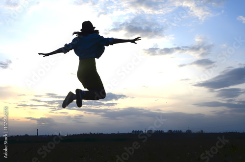 Young woman flying in the air