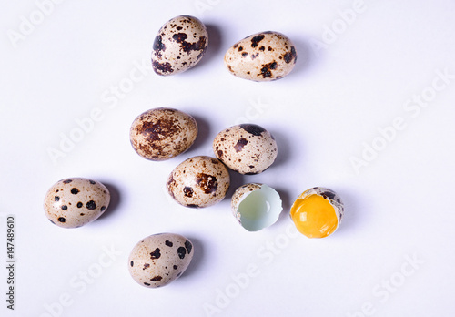Quail eggs on a white surface
