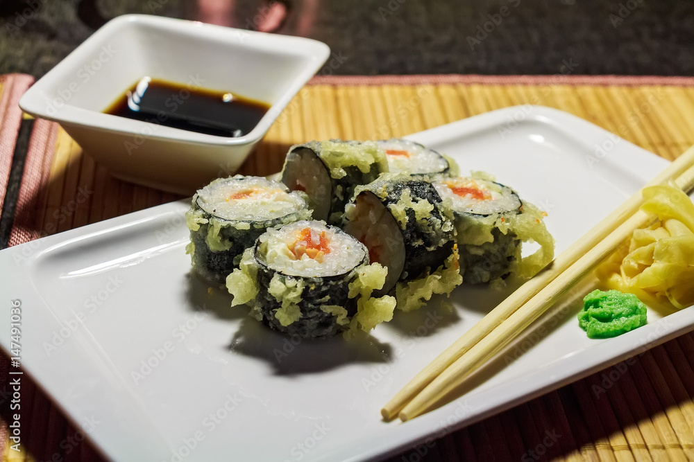 Hot fried Japanese rolls on plate Hot fried Japanese rolls on plate