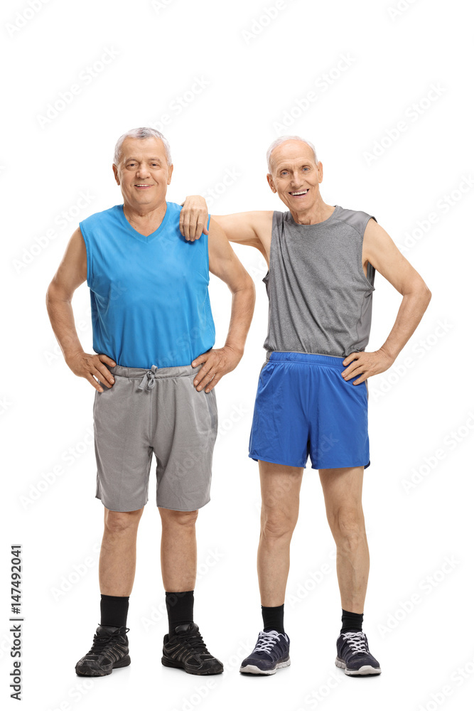 Two mature men dressed in sportswear looking at the camera Two mature men dressed in sportswear looking at the camera