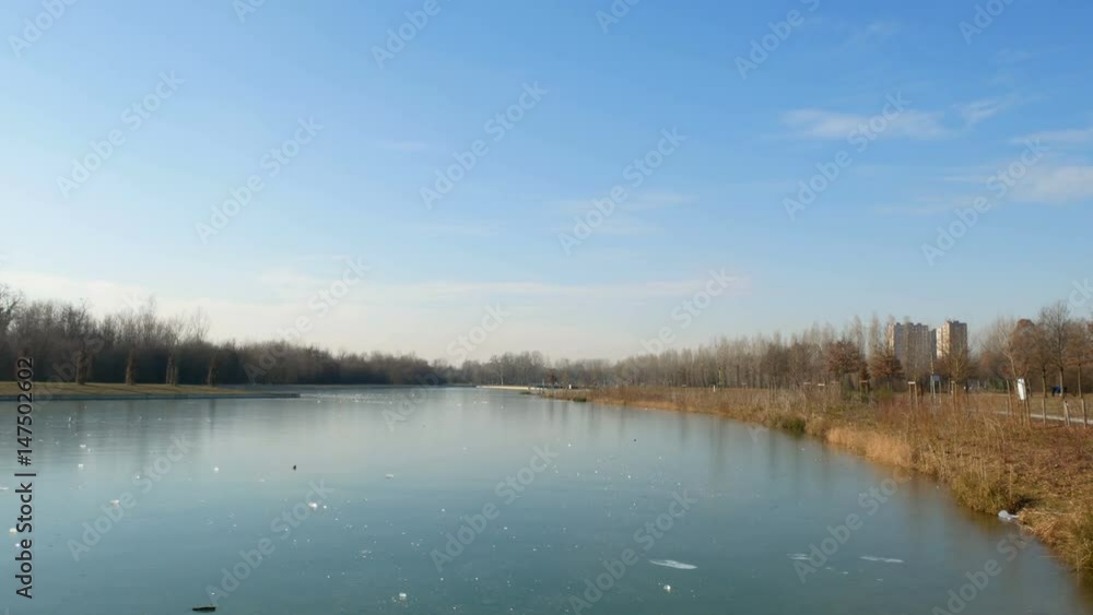 Artificial pond in Parco Nord, a park created on an ex industrial area in the north of Milan, Italy. Artificial pond in Parco Nord, a park created on an ex industrial area in the north of Milan, Italy.