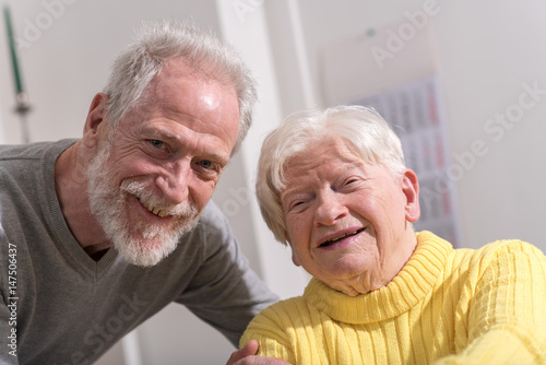 Portrait of happy grandmother with her son