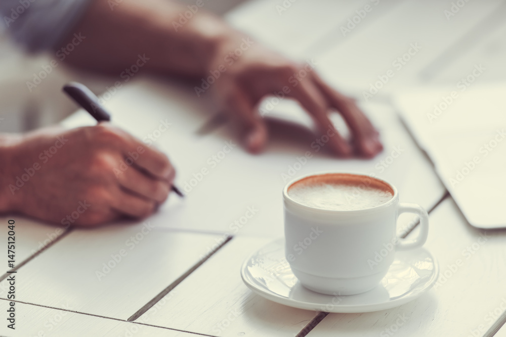 Businessman working in cafe Businessman working in cafe