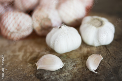 fresh garlic on wooden background