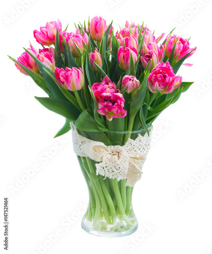 Wallpaper Mural Bouquet of bright pink tulips in glass vase isolated on white background Torontodigital.ca