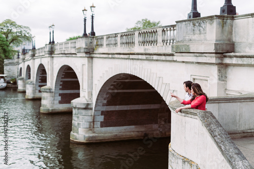 Old bridge with couple photo