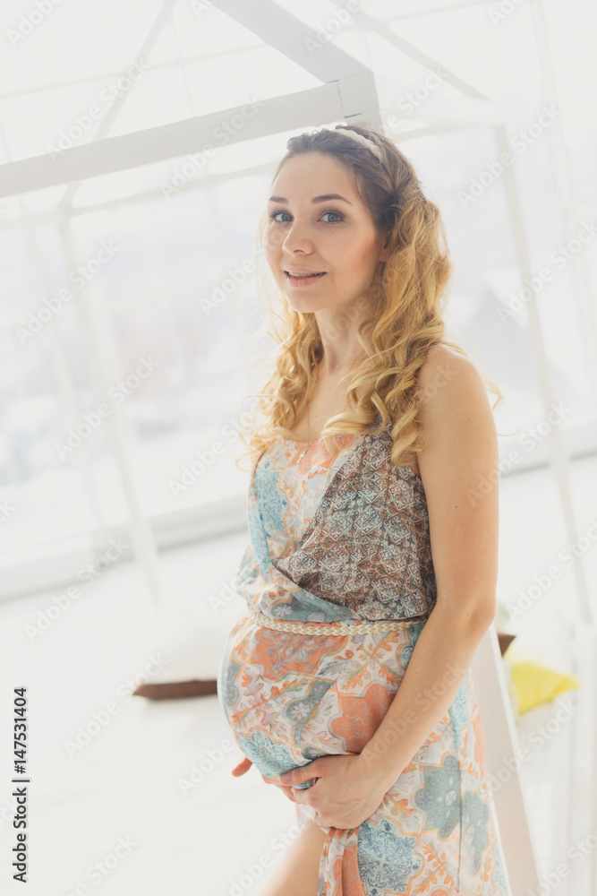 pregnancy, rest, people and expectation concept - close up of happy smiling pregnant woman