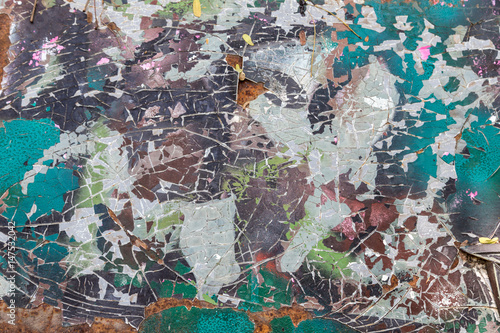 old cracked camouflage paint texture on metal © deaw59