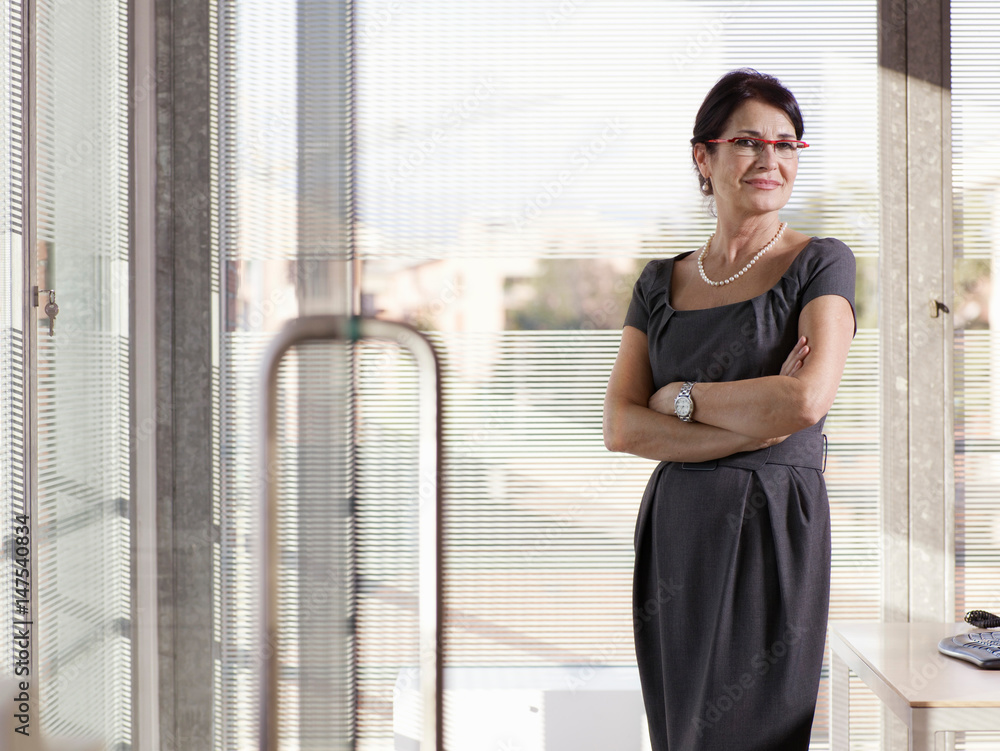 Portrait of business woman smiling Portrait of business woman smiling