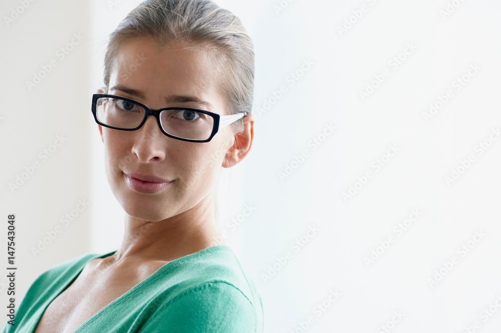 Woman with glasses looking at camera Woman with glasses looking at camera